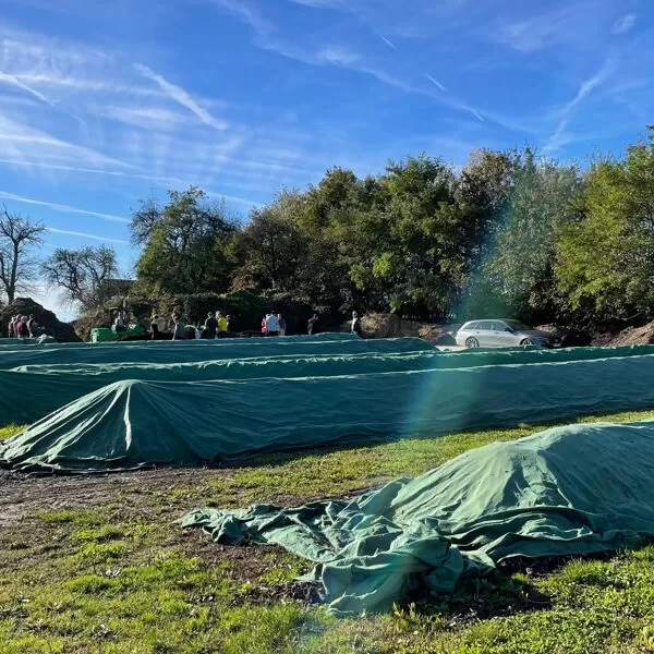 Compost piles are covered with Toptex compost cover